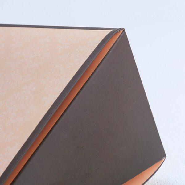 Vintage beige triangular hand-held cosmetic gift box with wooden ring and bow