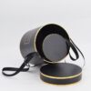 Black gold cylindrical flower gift box with handle